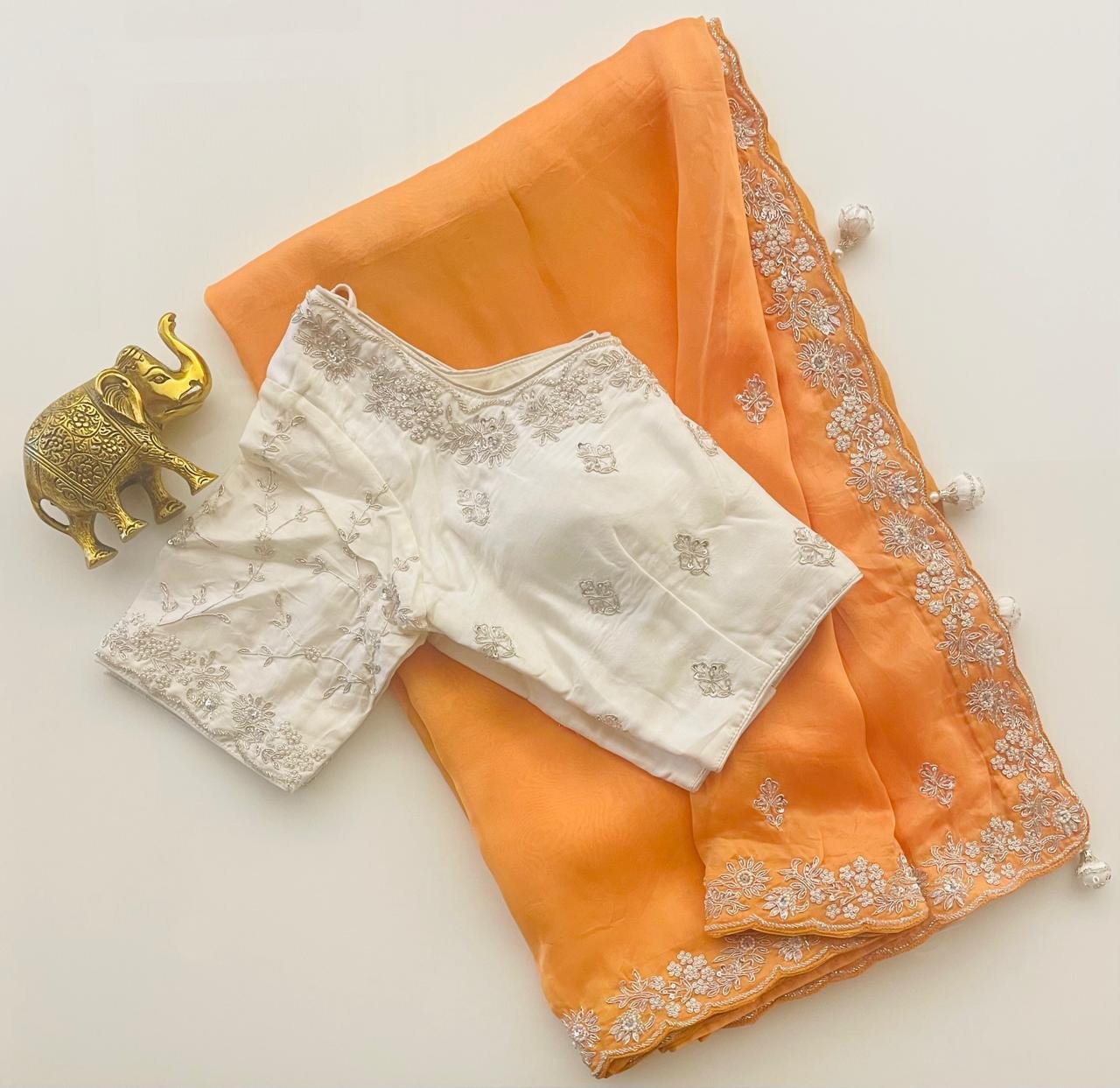 ORANGE SAREE WITH STITCH BLOUSE