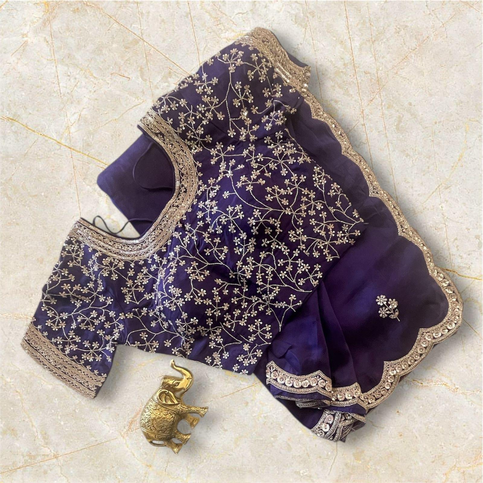 PURPLE SAREE WITH FANCY BLOUSE