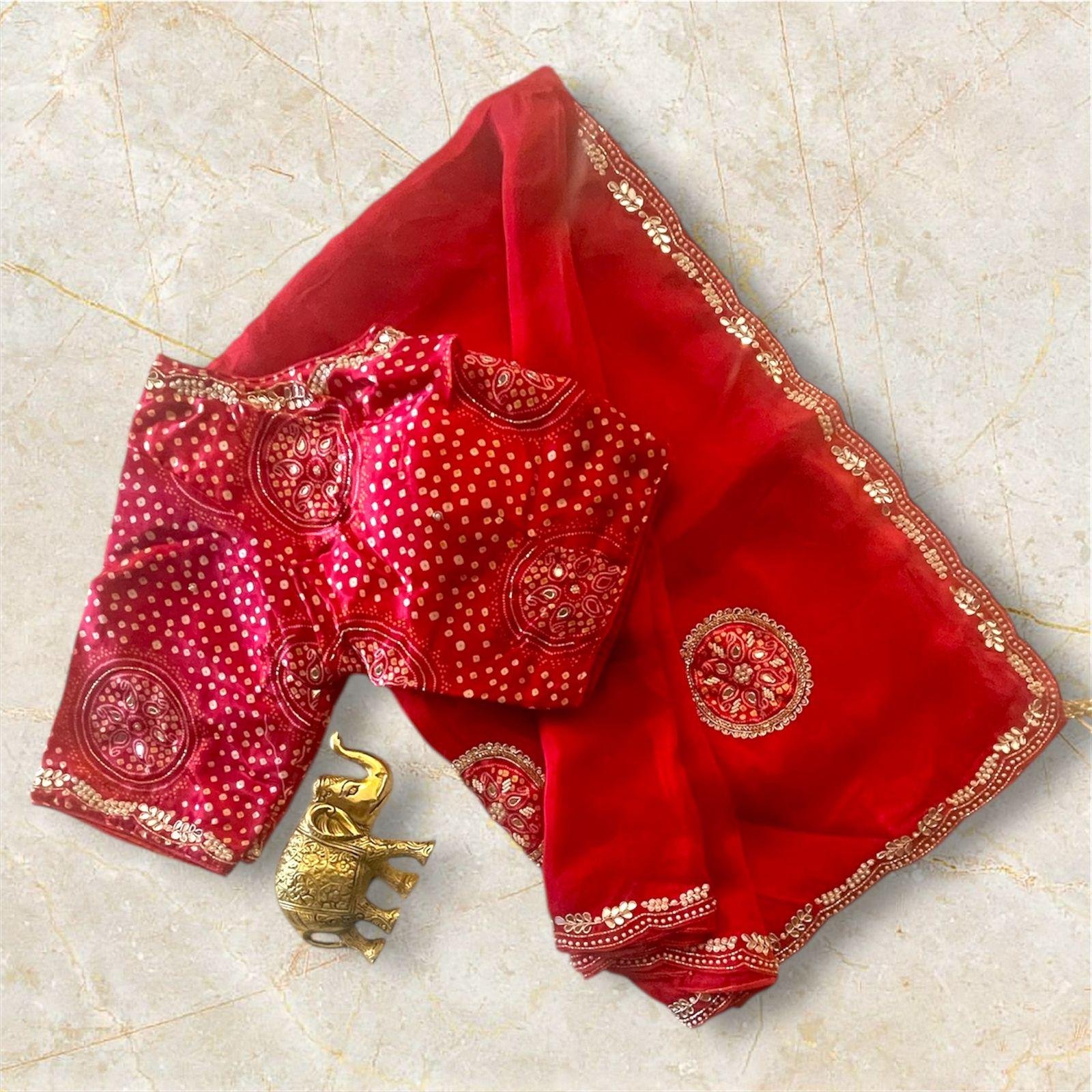 RED SAREE WITH BANDHANI BLOUSE